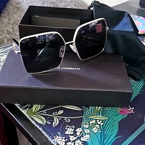 Dolce&Gabbana black and gold sunglasses.